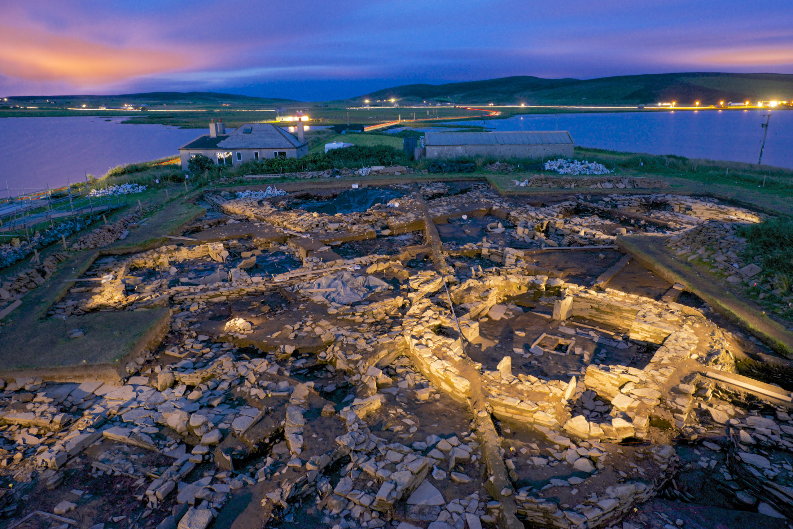 The archeology dig site at the Ness of Brodgar in Orkney that is revealing a Neolithic sacred site hitherto unknown. The dig is under the direction of Nick Card from ORCA in Orkney. Large structures are coming to light after several years of digging, revealing a 1,000 year history of occupation and development at the transitional period between hunter/gatherer society and the coming of agriculture.  Nick Card 
MA MIFA FSAScot
Senior Projects Manager
Orkney Research Centre for Archaeology (ORCA)
c/o Orkney College
East Road
Kirkwall, Orkney
KW15 1LX

Nick.Card@orkney.uhi.ac.uk 
Tel: 01856 569342 
Mobile: 07715793699