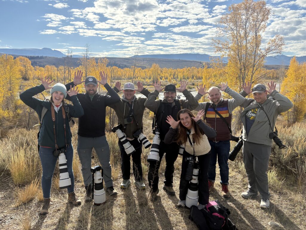Students posing for a photo after a photo day in the Grand Tetons during a Summit Nature Photography Workshop